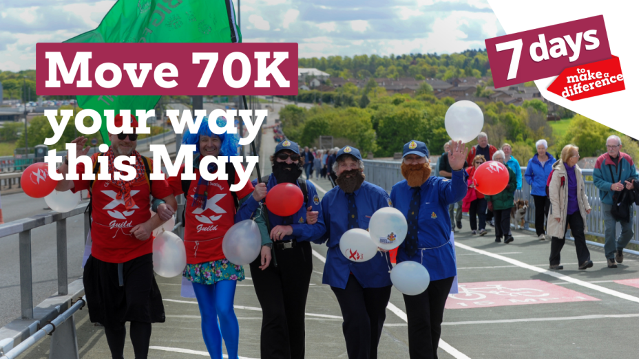 A group of Christian Aid fundraisers taking part in a walk. They are dressed in fancy dress costumes. The copy reads 'Move 70k your way this May'. 