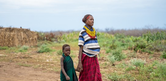 Donnay and her child walking together.